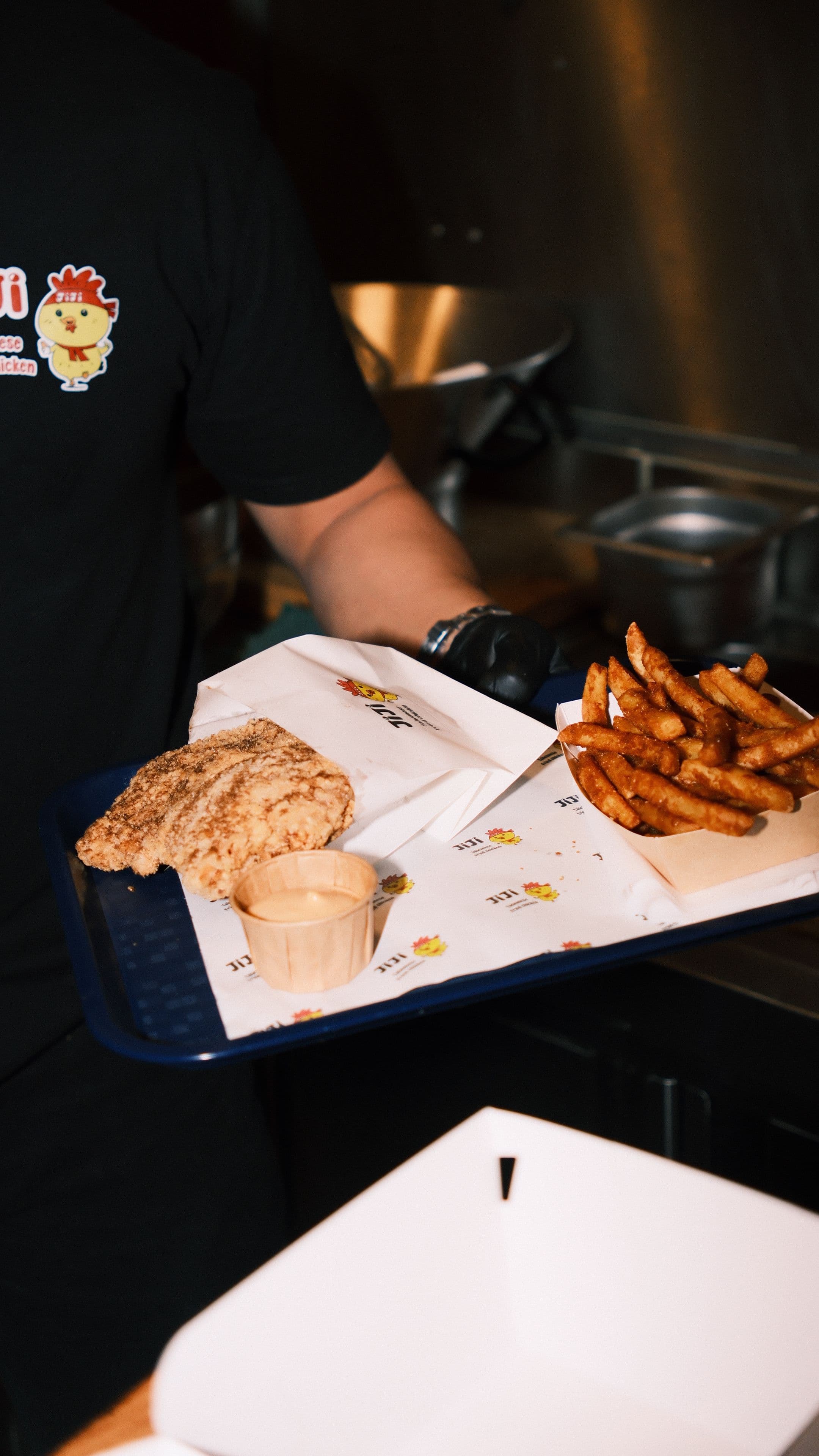 JiJi team preparing Taiwanese fried chicken in the kitchen